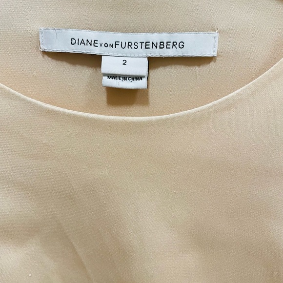 Crème colored Diane von Furstenberg, new condition aside from unraveling shown - Picture 2 of 4